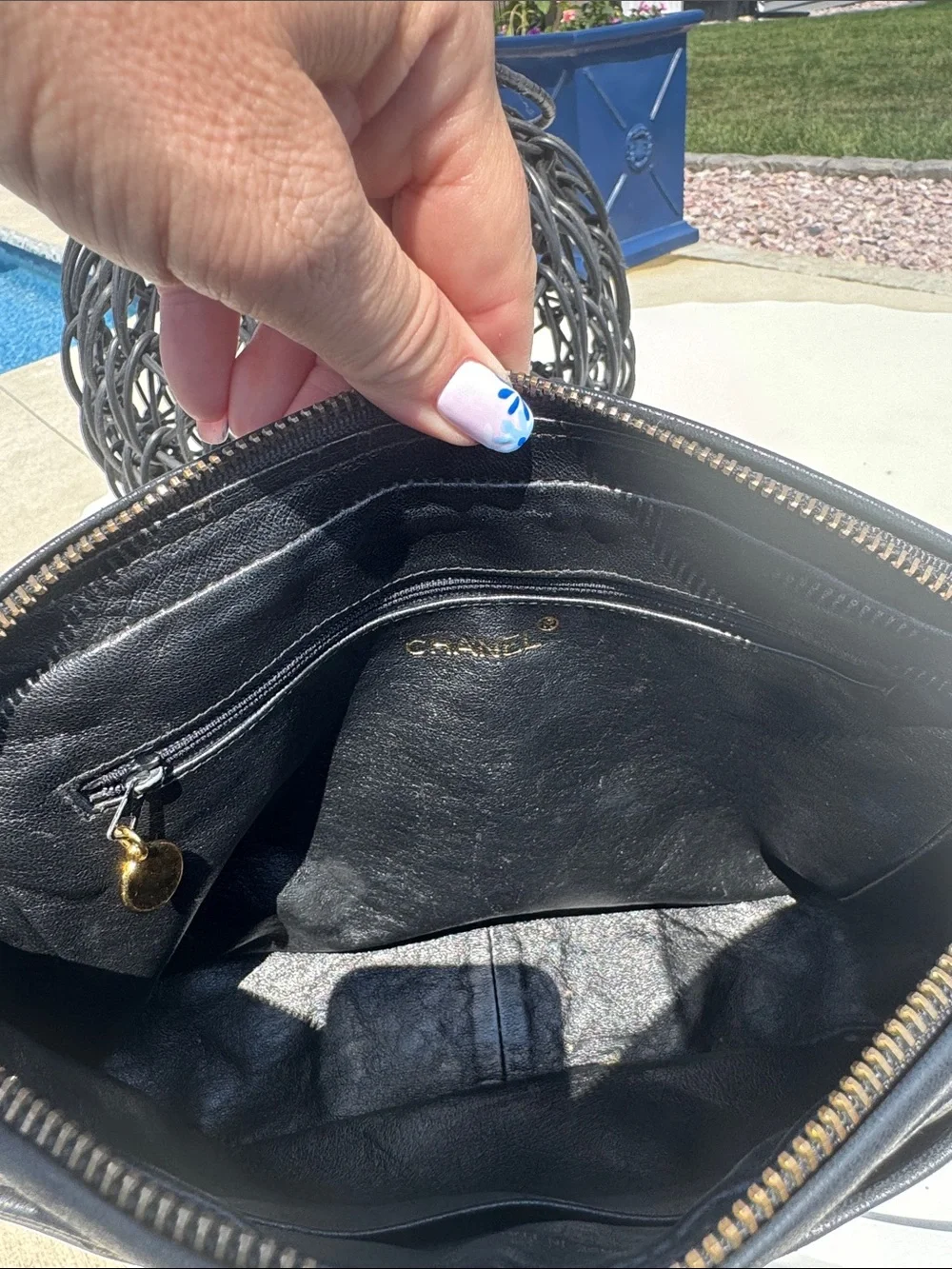 CHANEL Black Quilted Leather Shoulder Baguette with Embossed CC